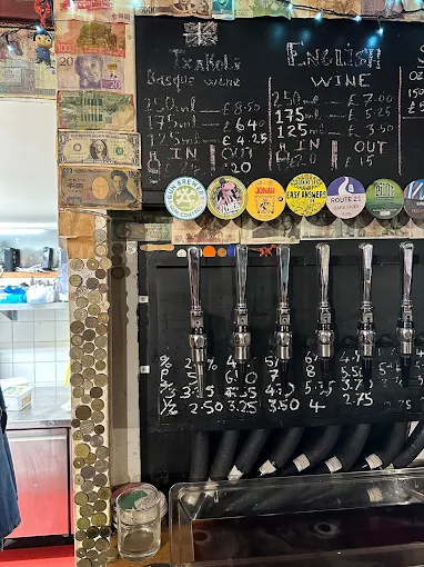 The Patch — bar taps beneath the wine board